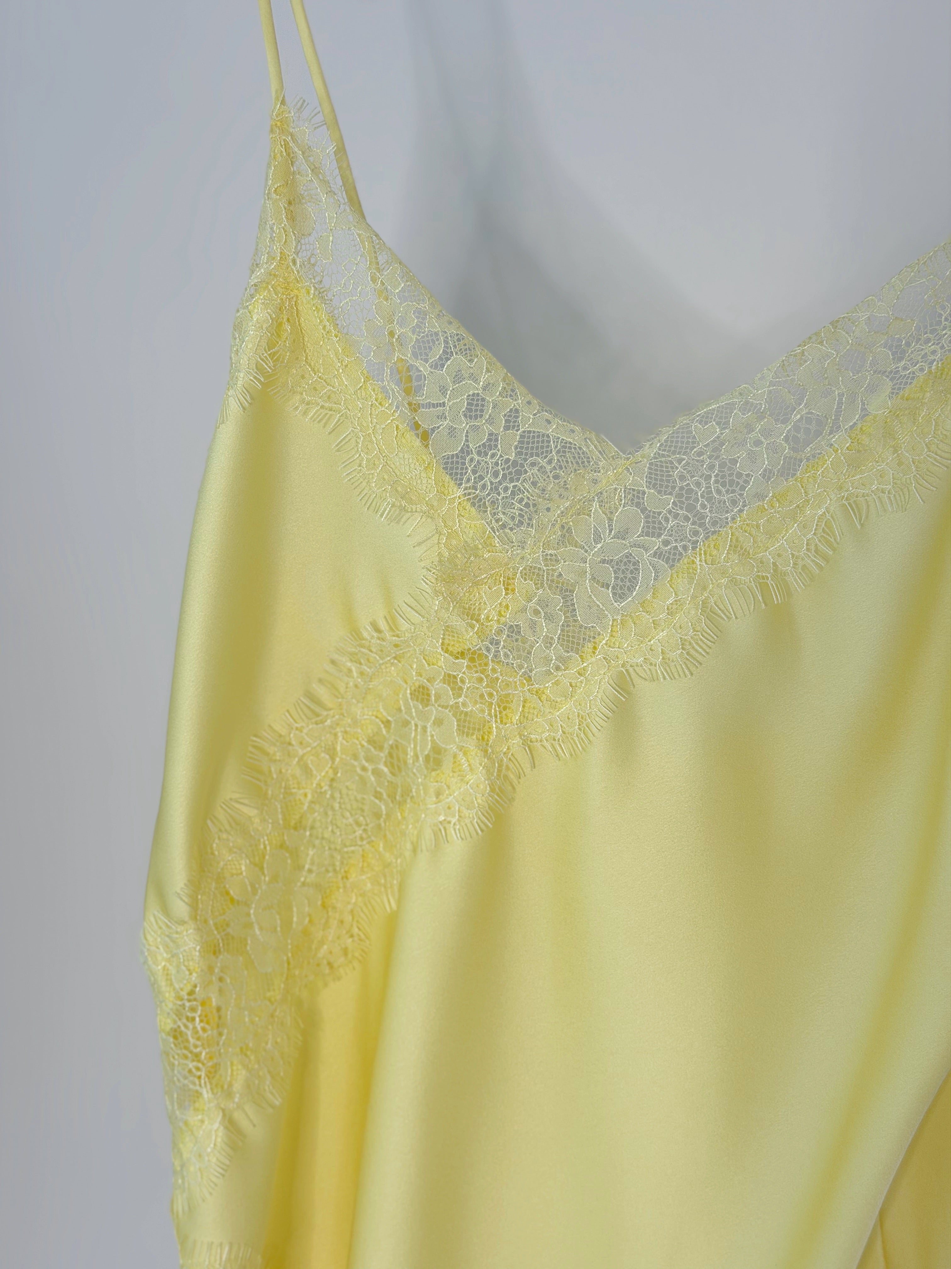CANOTTIERA ASSIMETRICA CON PIZZO