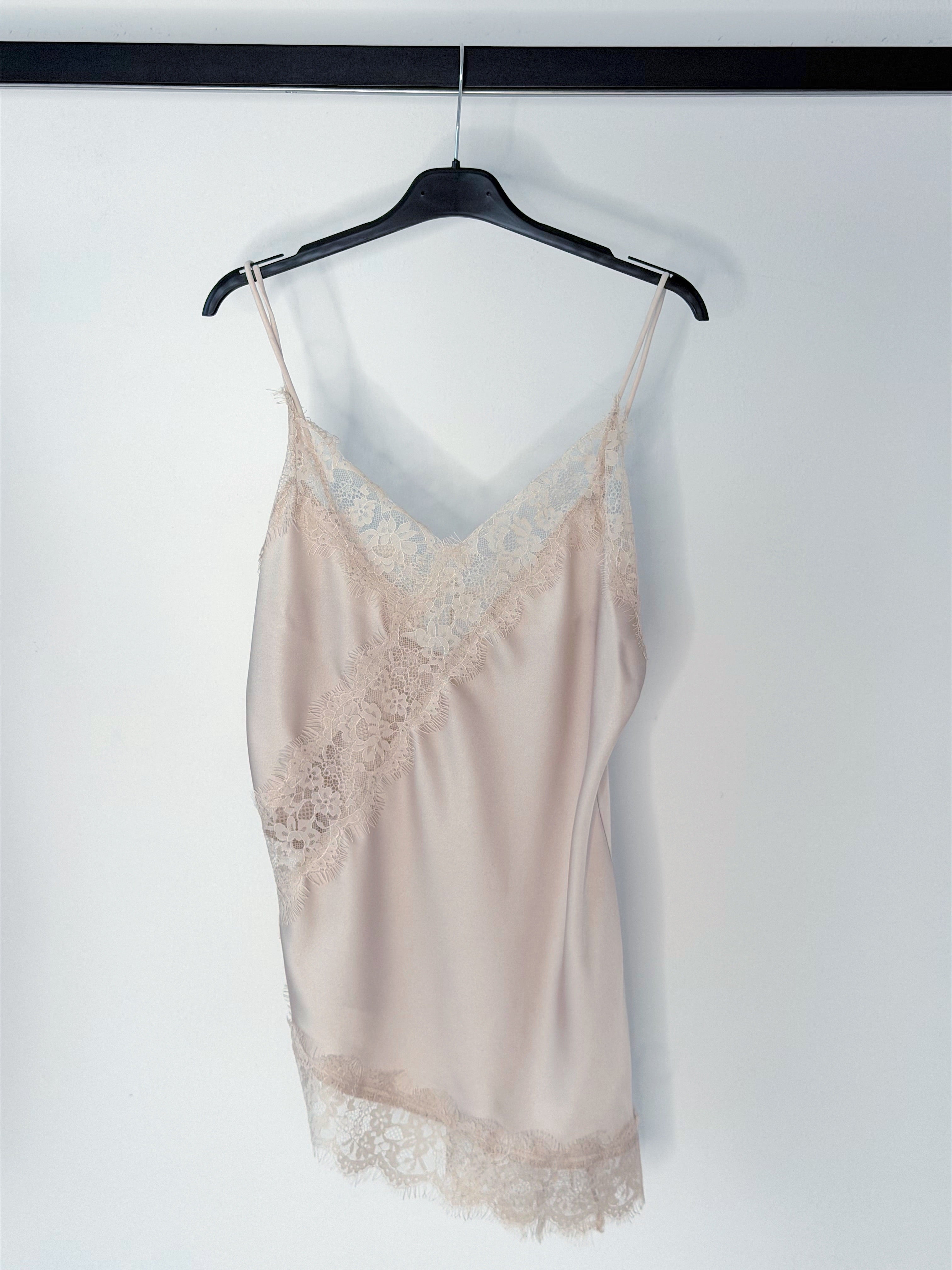 CANOTTIERA ASSIMETRICA CON PIZZO
